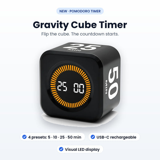 Black gravity cube timer with LED display and orange progress ring
